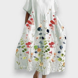 Liliane | Dress for summer events with floral print, ensuring freedom of movement